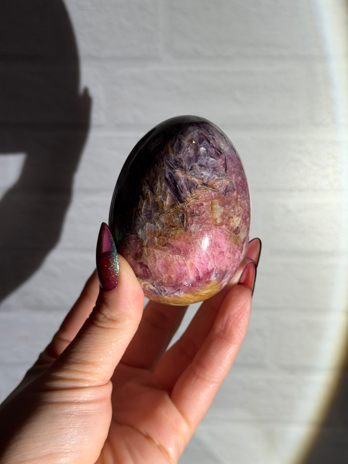 large lepidolite with pink tourmaline egg