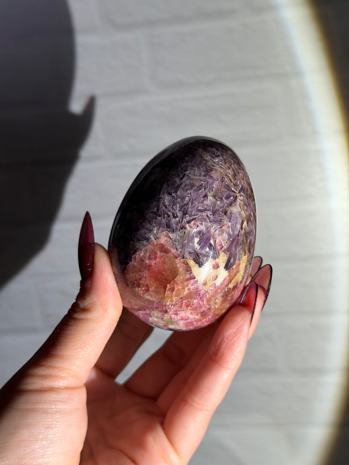 large lepidolite with pink tourmaline egg