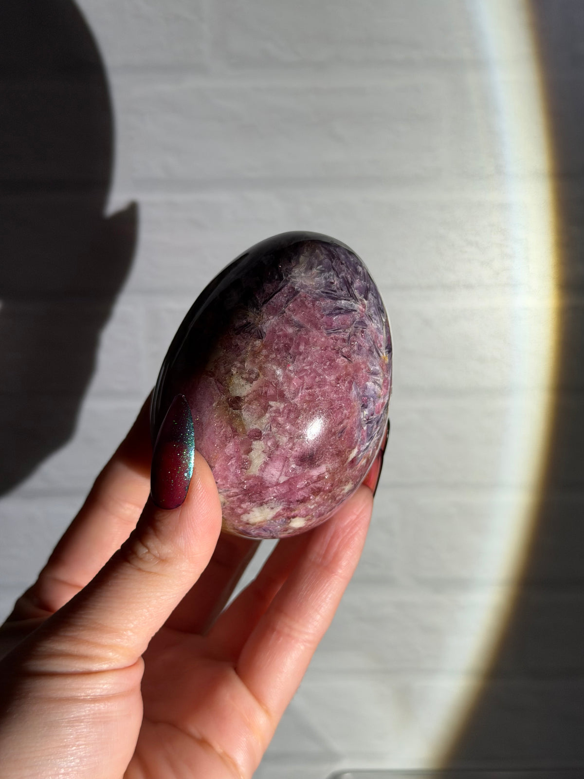 large lepidolite with pink tourmaline egg
